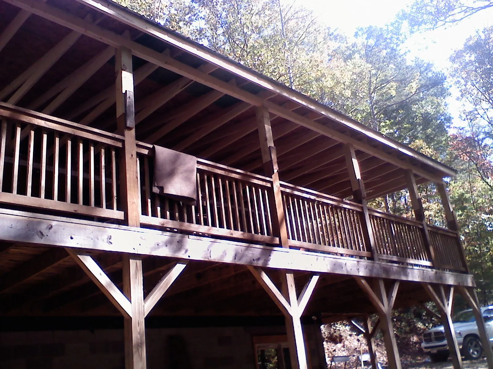 Timber framing under a new elevated porch and deck — Roof Leak Repair in Rollinsville by Roofing Brothers